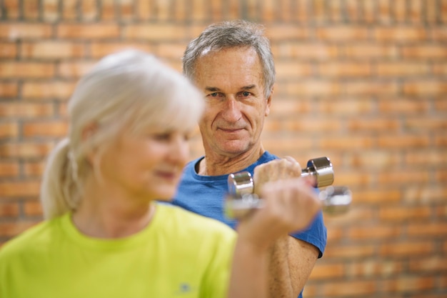 Free photo retired couple working out