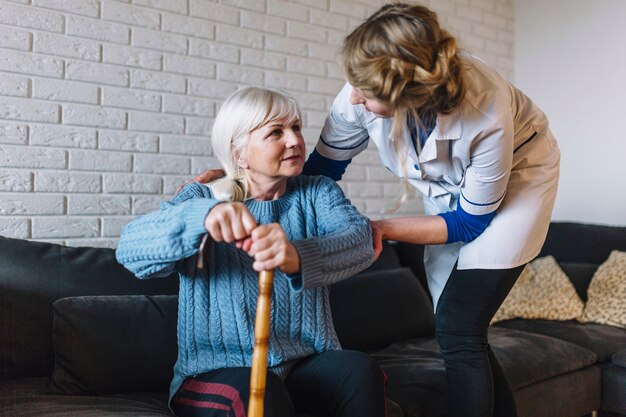 retirement home concept with nurse and woman