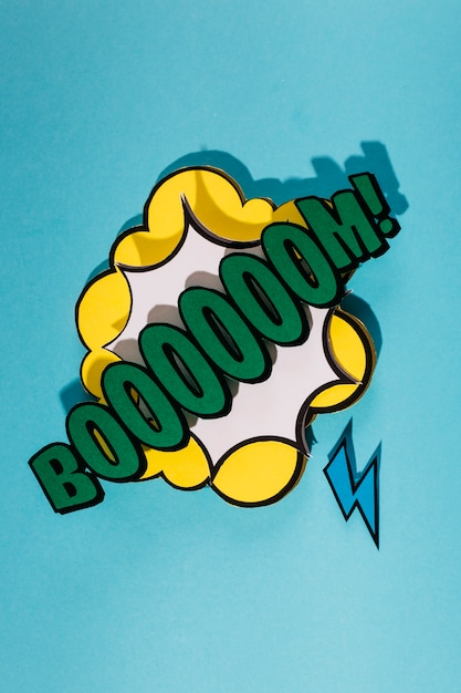 Free photo retro boom speech bubble on blue background