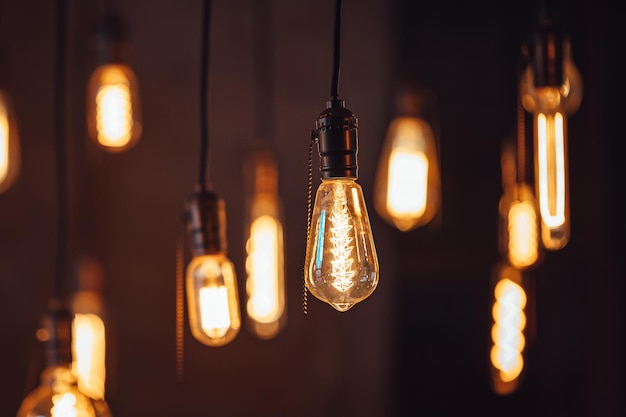 Retro lamps hanging on the ceiling of a modern house or cafe