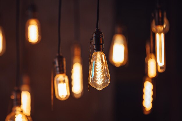 Retro lamps hanging on the ceiling of a modern house or cafe