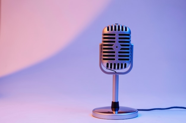 Free photo retro microphone isolated on color background