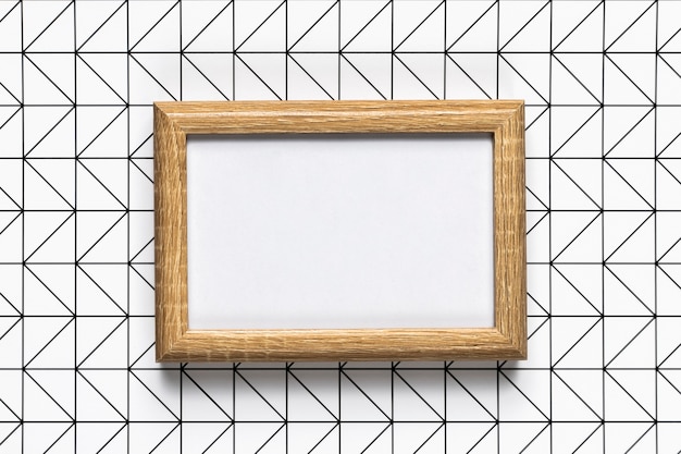 Retro wooden frame with pattern background