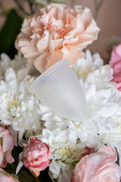 Reusable menstrual cup product with flowers