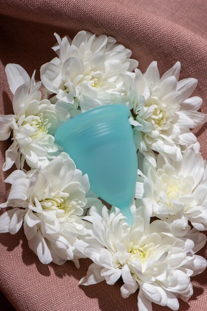 Reusable menstrual cup product with flowers