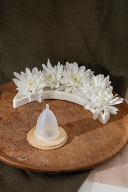 Reusable menstrual cup product with flowers