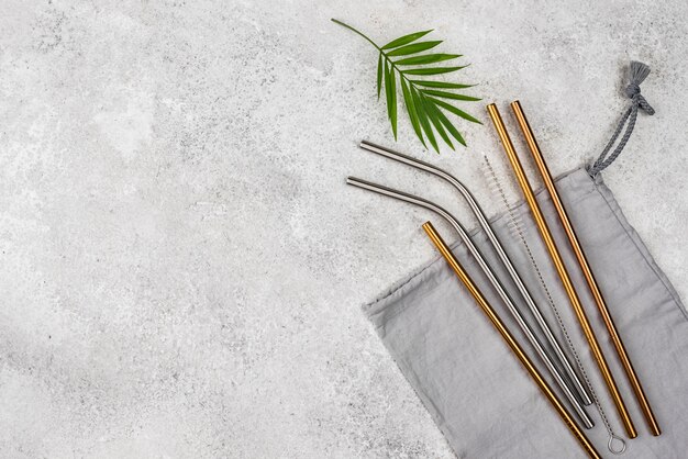 Reusable metal straws and leaves