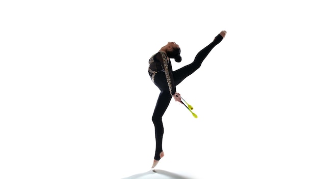 Free photo rhythmic gymnast in professional arena