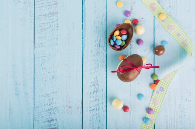 Ribbon near chocolate eggs