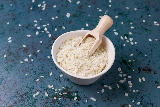 Free photo rice flakes, rice noodles, rice bread and rice, top view