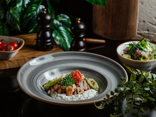 Rice garnish with sauteed mushrooms