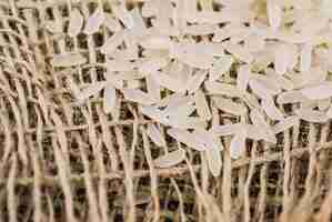 Free photo rice grains on linen fabric