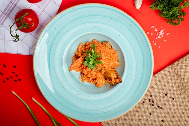 Rice in tomato sauce with sea food