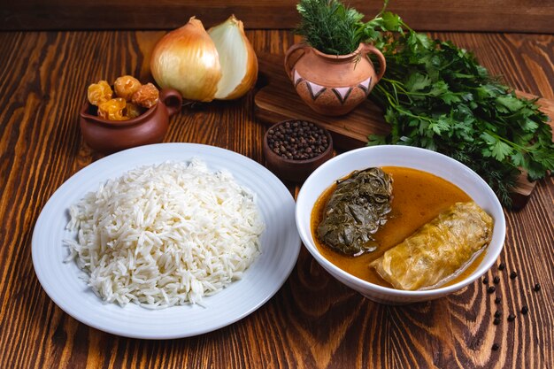 Rice with cabbage roll greens onion spices side view