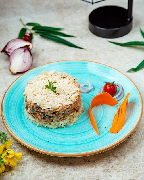 Rice with chicken and mushrooms in a creamy sauce