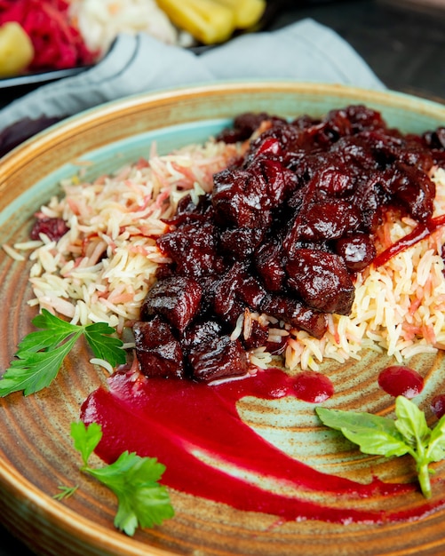 Rice with meat in tomato sauce side view