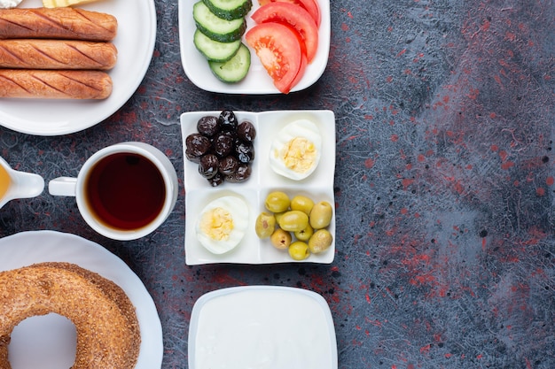 Free photo rich breakfast table with variety of ingredients.