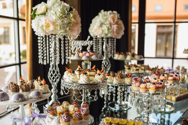 Rich candy bar with variety of sweets on the holiday