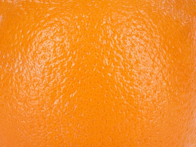 Ripe orange. Fruit with juicy flesh. Close-up shot.