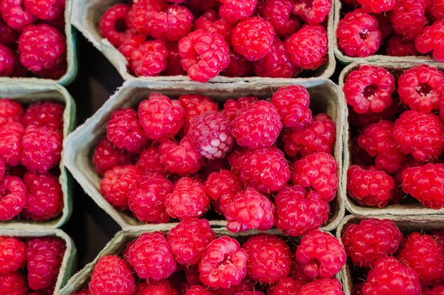 Ripe and sweet raspberries in the display case