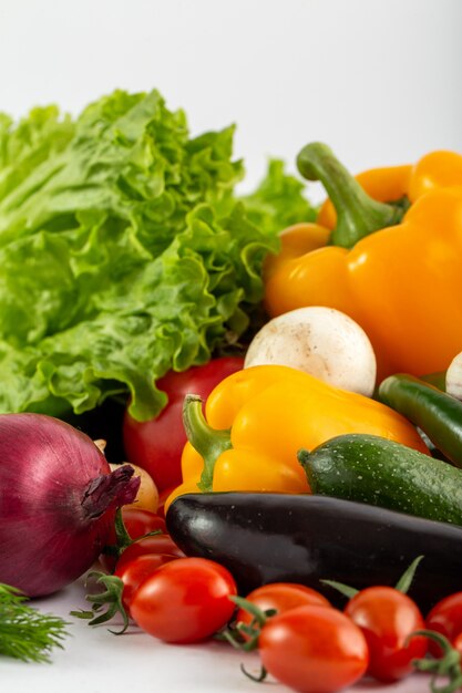 Ripe vegetables fresh colorful salad vegetables on white background