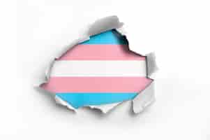 Free photo ripped paper with flag transexual