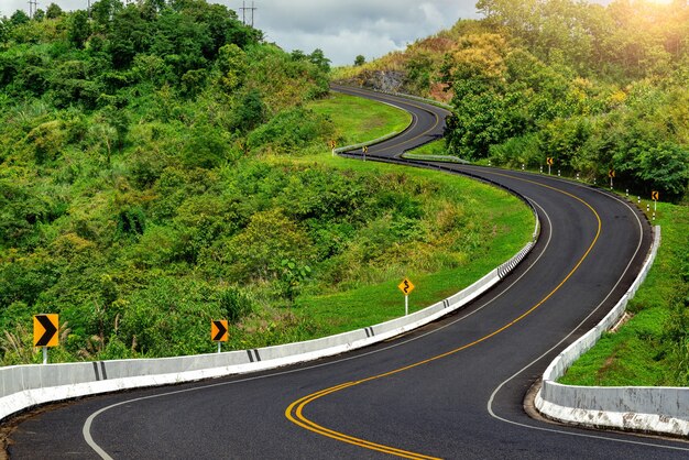 Road no.3 over top of mountains with green jungle in Nan province, Thailand