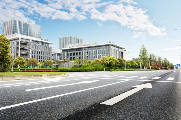 Road with buildings background