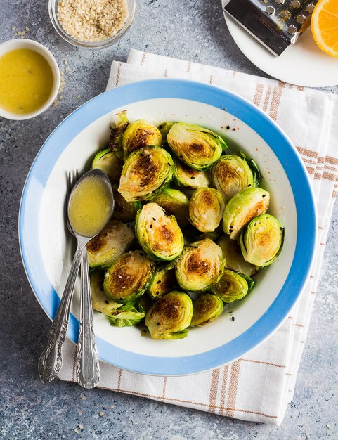 Roasted brussels sprouts cabbage with salt pepper sesame