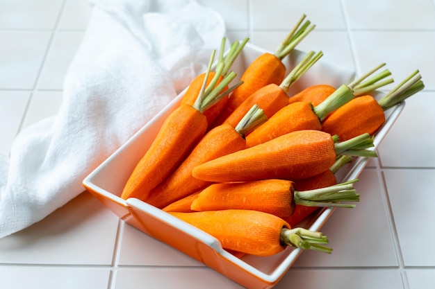 Free photo roasted carrot lentil salad with feta yogurt and dill