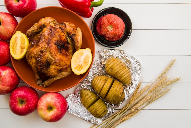 Roasted chicken with lemon on plate