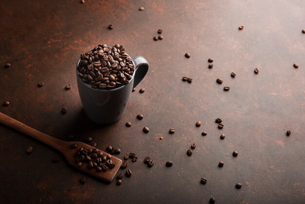 Roasted coffee beans in mug