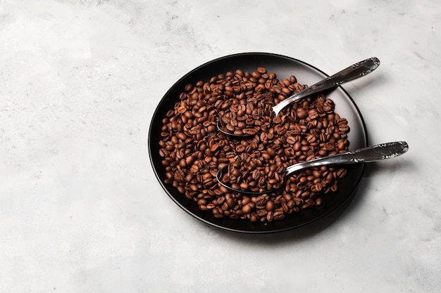 Roasted coffee beans on plate