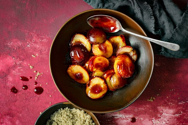 Roasted plums with brown sugar top view