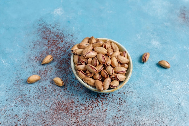 Roasted salted pistachio nuts in nutshell.