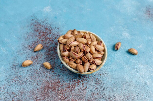 Roasted salted pistachio nuts in nutshell.