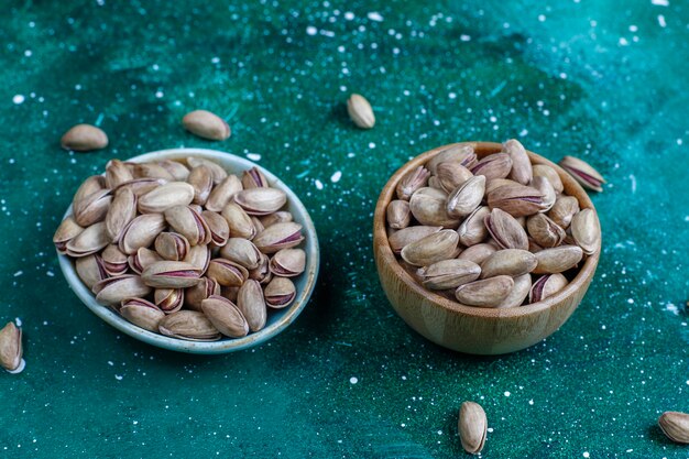 Roasted salted pistachio nuts in nutshell.