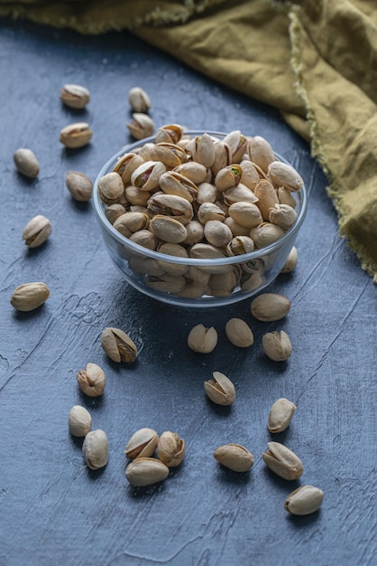 Roasted And Salted Pistachios In Glass Bowl