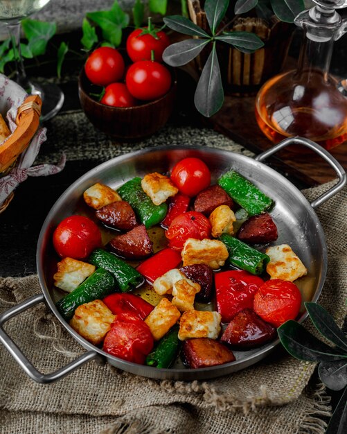 roasted sausage and vegetables in pan
