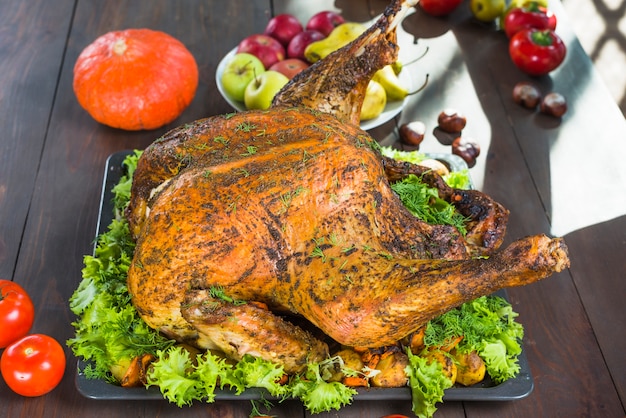 Roasted turkey with fruits on plate 