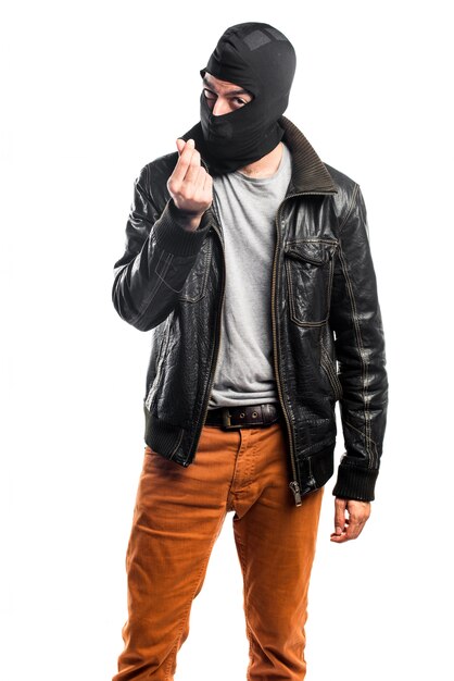 Robber doing a money gesture