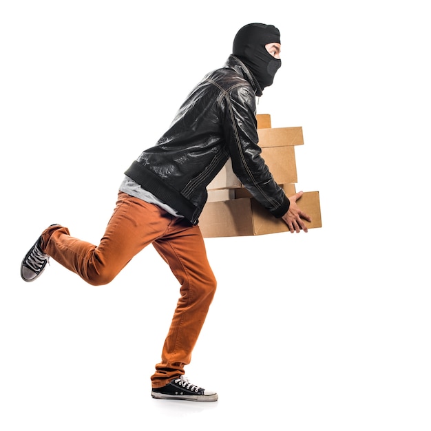 Free photo robber holding boxes