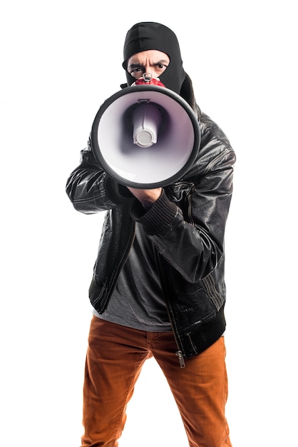 Free photo robber shouting by megaphone