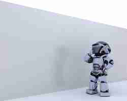 Free photo robot looking pensively at a white wall