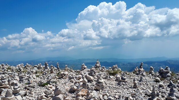 Rock balancing on mountain in Montenegro