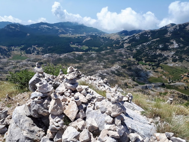 Rock balancing on mountain in Montenegro