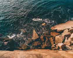 Free photo rock formations near the sea in niteroi