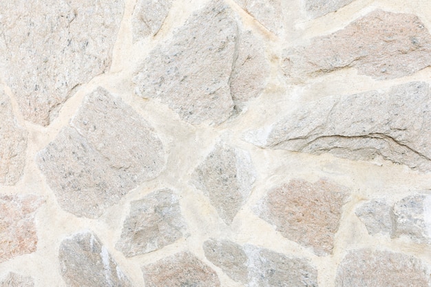 Foto gratuita rocce in cemento con crepe
