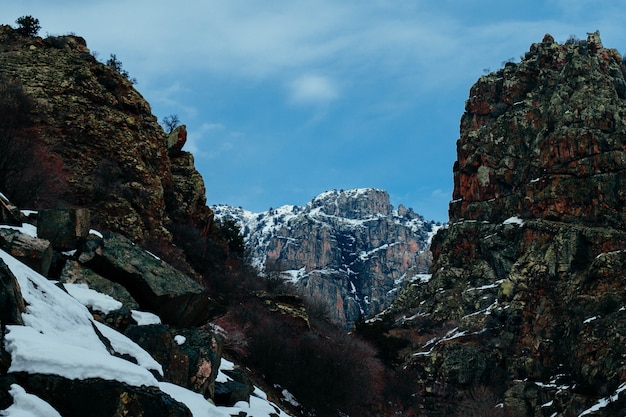 Free photo rocky snowy mountains