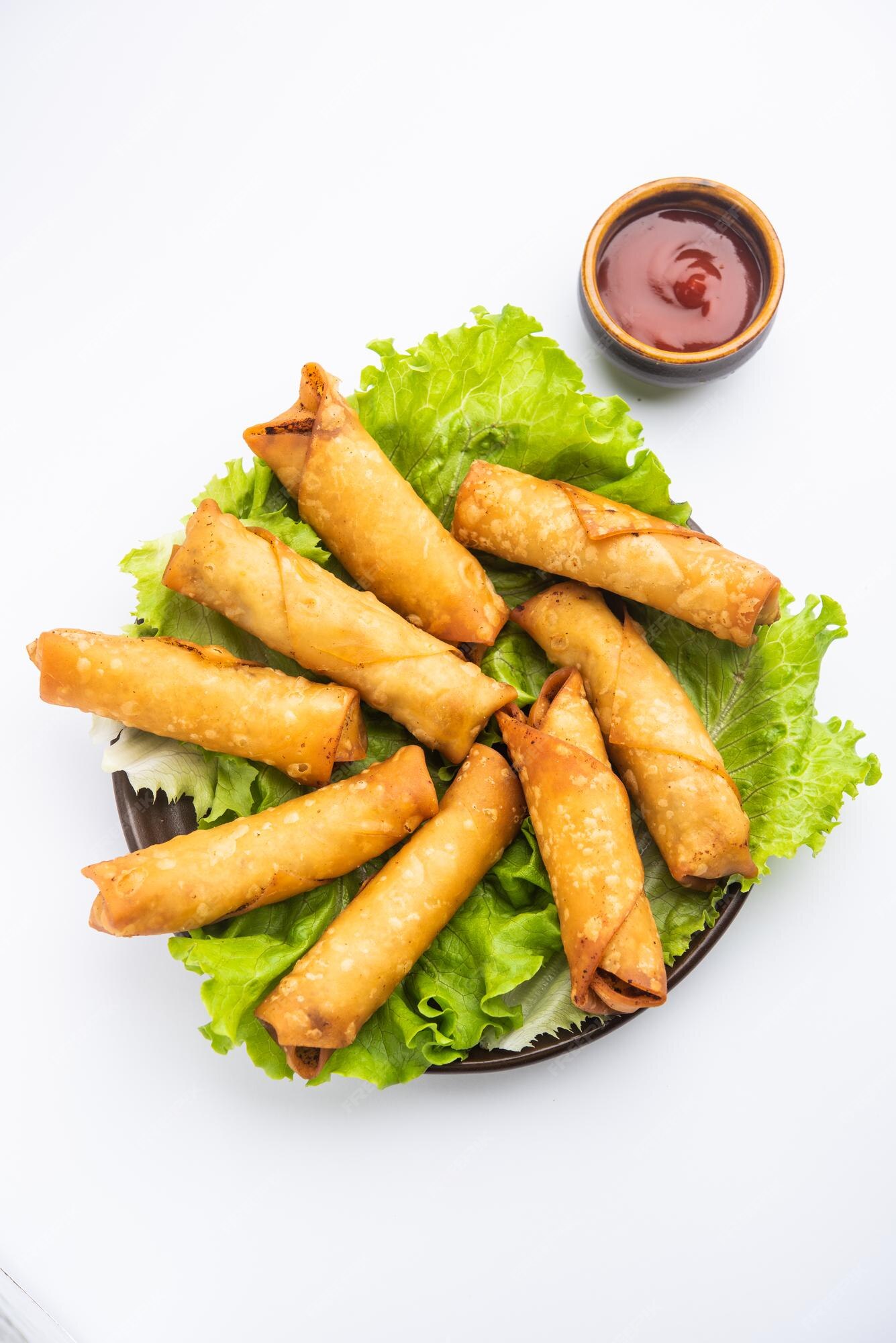 Premium Photo | Roll shaped cigar samosa are the perfect finger food ...